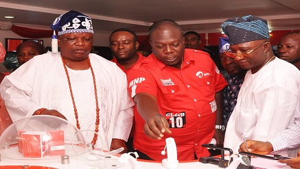 (L-r):Oba Kabiru Agbabiaka, Special Guest, Osolo of Isolo Kingdom,Olawale Alao, Zonal Business Manager, Airtel, Lagos and Samson Adele, Lagos-based Entrepreneur, during the tour of the newly commissioned Express Shop at Okota-Isolo, Lagos on Wednesday.